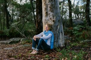 Beccy Howe author, relaxing under a tree